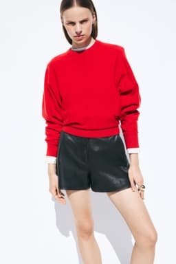 Red knit sweater from the recorded H&M new-arrivals result